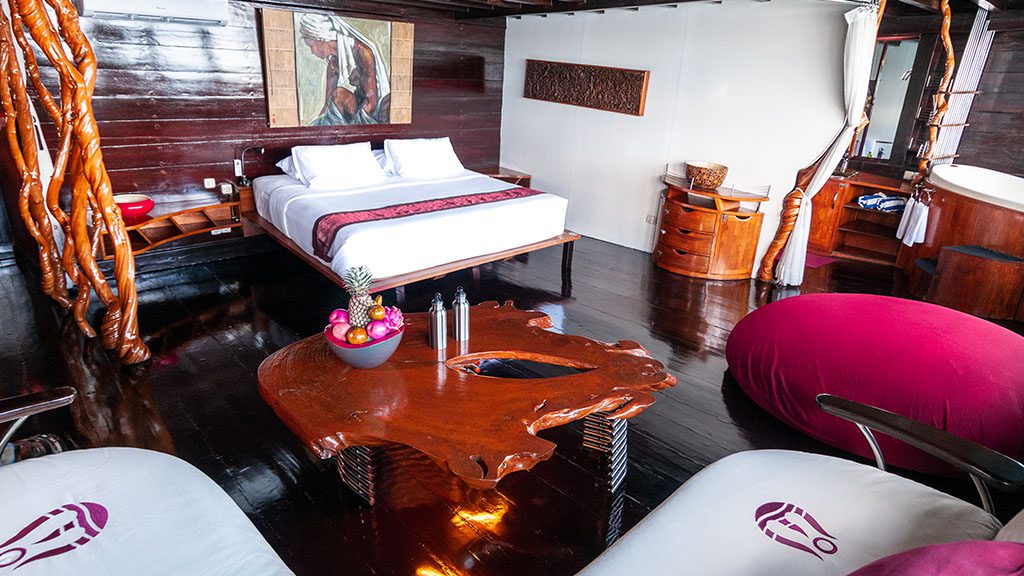 Dewi Nusantara Liveaboard cruising Raja Ampat, Komodo - Master suite 1 Dewi Nusantara's interior is that of a floating boutique resort featuring high-end amenities. Its itineraries include some of the best diving in Indonesia